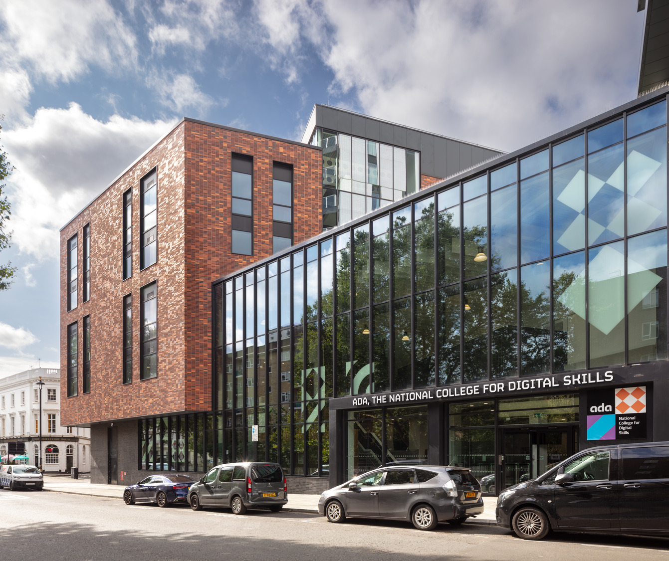 Ada College is opening it’s new facility to students for the 2023 academic year. Designed by LSI Architects, and refurbished by Wates Smartspace, the National College for Digital Skills has moved into new premises on Sutherland St in Pimlico, London. Named after Ada Lovelace, a 19th century computer programmer, the College works to educate and empower the next generation of digital talent with a particular focus on women and individuals from low-income backgrounds. The Pimlico campus building is spread over 5 floors and includes a cafe, sports hall, games room and a roof terrace with aspirational views over central London. The building’s previous engineering workshops have been converted into IT suites for the college’s core computing qualifications, and lecture theatres have replaces traditional classrooms. Client: Ada College. Architect: LSI Architects. Contractor: Wates Smartspace / Wates Group. Engineers: Mott MacDonald