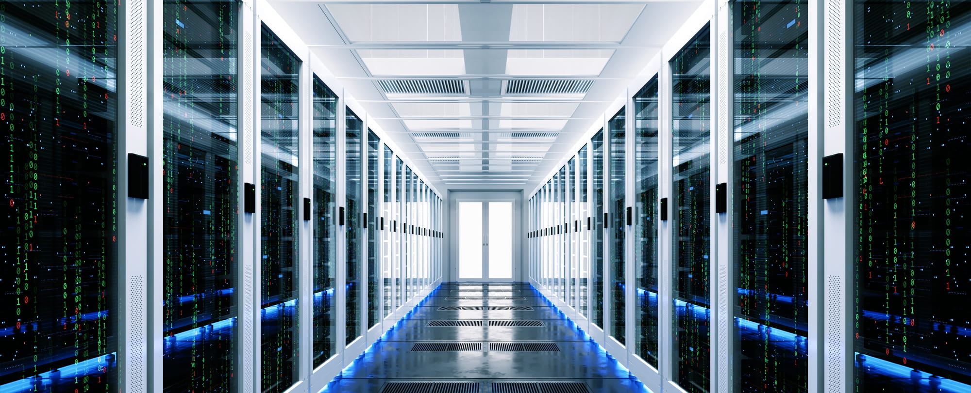 A corridor in a data center lined with server racks, featuring illuminated blue accents and digital displays showing binary code.